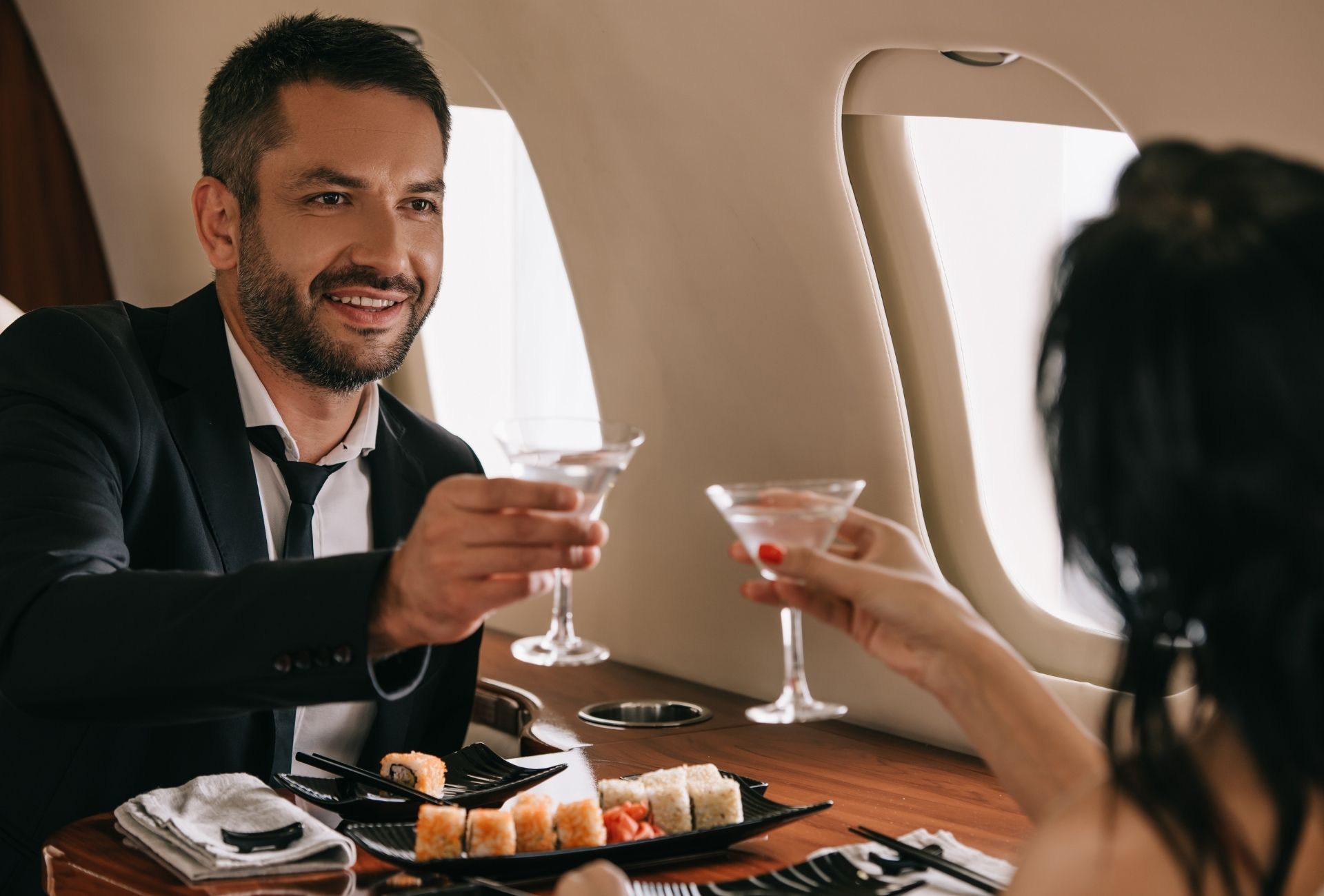 Private Jet Man and Women with Champaign